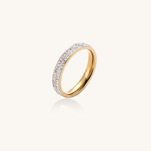Gold-plated eternity band with princess-cut zircon center stones and pavé crystal edges—luxury private-label statement ring
