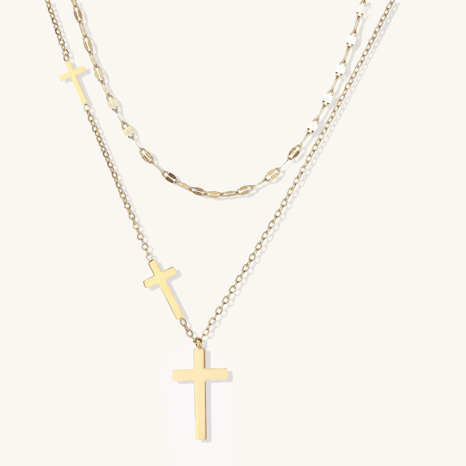 Gold chain necklace with alternating freshwater pearls and baroque pearl charms wrapped in floral filigree—elegant private-label jewelry collection display