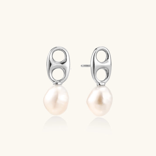 Sterling silver oval stud earrings with dual circular cutouts and suspended freshwater pearls on white background.