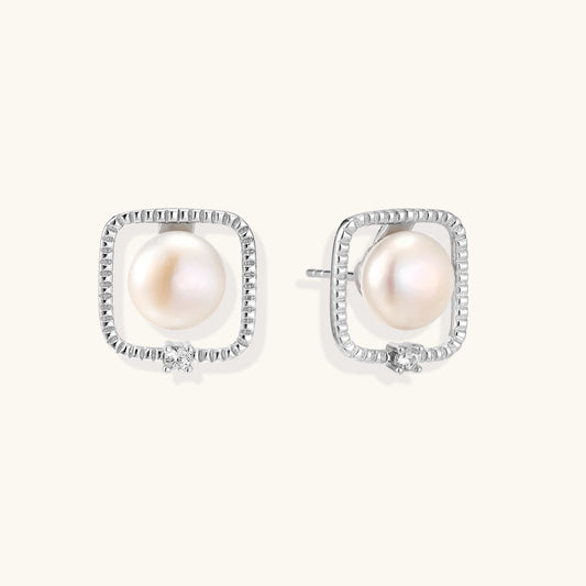 Square sterling silver stud earrings with freshwater pearls and crystal accents on white background.