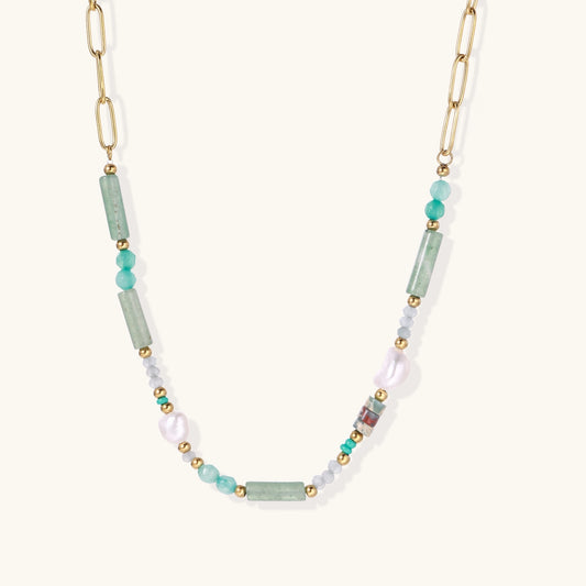 Gold-plated chain necklace with green prasem quartz, freshwater pearls, and mixed beads in modern asymmetrical design