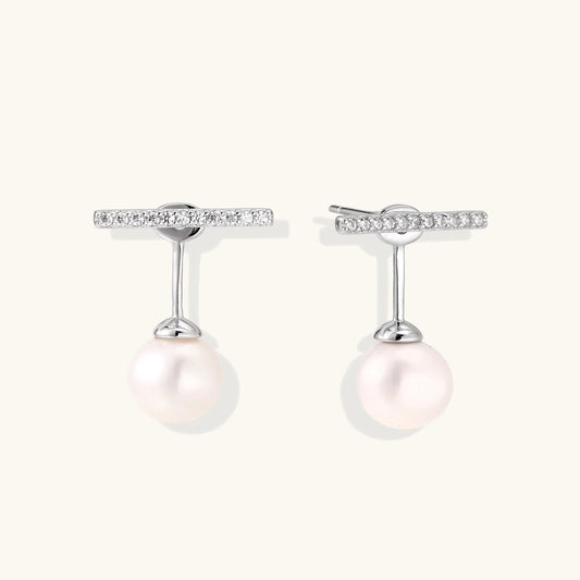 Rhodium-plated sterling silver ear jacket earrings with diamond-set horizontal bar and freshwater pearl drop